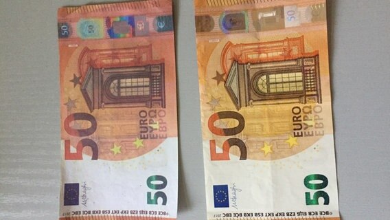 50-Euronoten im Vergleich: links die Fälschung, rechts das Original. © Polizeipräsidium Neubrandenburg Foto: Claudia Tupeit
