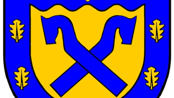 Das Wappen von Alt Meteln - ein goldenes Wappen auf blauem Grund mit stilisierten Pferdeköpfen. Darüber drei goldene Glocken und sieben goldene Eichenblätter © Gemeinde Alt Meteln 