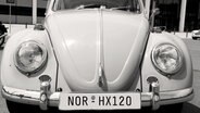 Ein alter Wagen mit dem Kennzeichen "NOR". © dpa / Creative Commons Foto: Patrick Seeger / ThorstenS