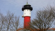 Blick auf den alten Leuchtturm auf der Insel Wangerooge. © Mohssen Assanimoghaddam / dpa Foto: Mohssen Assanimoghaddam