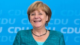 Angela Merkel auf einer Bühne auf Borkum. © picture alliance / dpa Foto: Joerg Sarbach