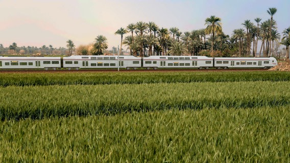 Die Illustration zeigt einen Zug in Ägypten. Siemens baut in Ägypten das erste elektrische Eisenbahnnetz auf und liefert dafür bereits im ersten Schritt ICE- und Regionalzüge. © dpa-Bildfunk Foto: Siemens AG/dpa