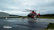 Ein Rettungshubschrauber steht einsatzbereit am Boden. © Moritz Ohlsen 