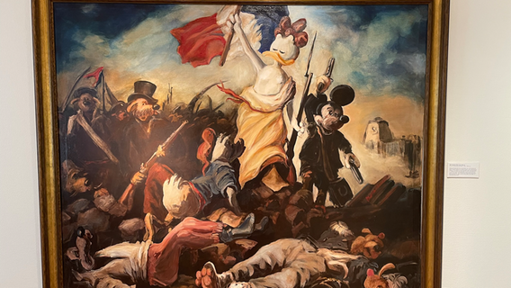 Ein Bild, das ein berühmtes Werk im Stil von Donald Duck nachempfindet, hängt an einer Wand des Museum und Stiftung Landdrostei in Pinneberg im Rahmen der Wanderausstellung Duckomenta. © NDR Foto: Jonas Hanst