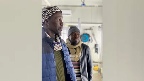 Two men.  The fisherman Mamadou Sarr and scientist Ibrahima Camara.  © Eva-Maria Brodte Photo: Eva-Maria Brodte