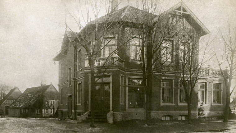 Ein historischer Postkartendruck der Gerberstraße in Quickborn © Stadtarchiv Quickborn