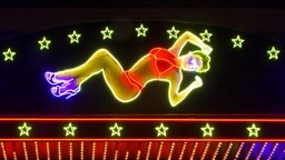 Ein Neonschild stellt eine Tänzerin dar. © picture alliance / Bildagentur-o Foto: picture alliance / Bildagentur-o
