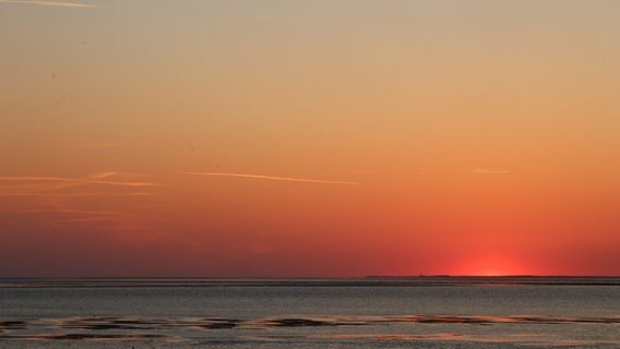 Sonnenuntergang über dem Wasser. © Ramona Erlemann Foto: Ramona Erlemann