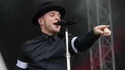 Der britische Sänger Olly Murs bei einem Auftrtitt in Hannover. Der britische Sänger Olly Murs bei einem Auftrtitt in Hannover. © NDR Foto: Axel Herzig