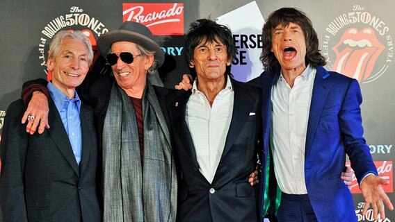 Charlie Watts, Keith Richards, Ronnie Wood und Mick Jagger (v.l.) alias die Rolling Stones im Juli 2012 Charlie Watts, Keith Richards, Ronnie Wood und Mick Jagger (v.l.) alias die Rolling Stones im Juli 2012 © EPA/ANDY RAIN
