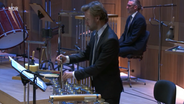 Percussionist in der Aufführung von Olivier Messiaens "Des Canyons aux Étoiles" im Rahmen der KunstFestSpiele Herrenhausen 2021 mit der NDR Radiophilharmonie unter Leitung von Ingo Metzmacher. © NDR 