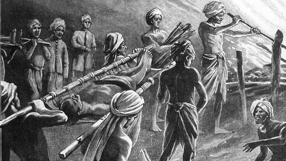 Leichenverbrennung von Opfern der Pest in Indien - Holzstich nach Paule Crampel 1907.  Foto: akg-images