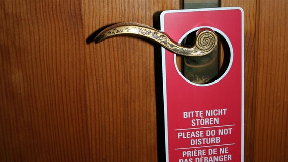Ein "Bitte nicht stören" Schild an einer Tür. © photocase Foto: Dot.ti