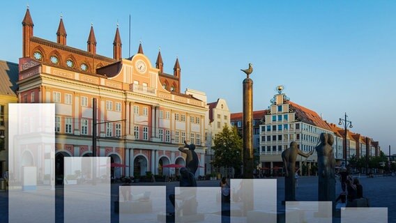 Neuer Markt in Rostock, im Vordergrund transparente Balkendiagramme. © Colourbox Foto: -