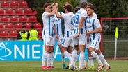 Rostocks Spieler bejubeln ein Tor. © picture alliance / Eibner-Pressefoto 