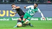 Niko Gießelmann (l.) von Union Berlin im Duell mit Leonardo Bittencourt von Werder Bremen © IMAGO / Nordphoto 