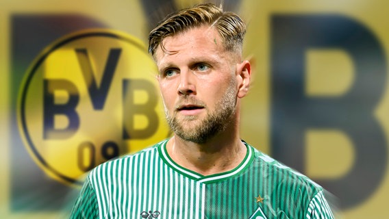 Nicals Füllkrug von Werder Bremen vor dem BVB-Wappen © picture alliance / SVEN SIMON | Anke Waelischmiller/Sven Simon 