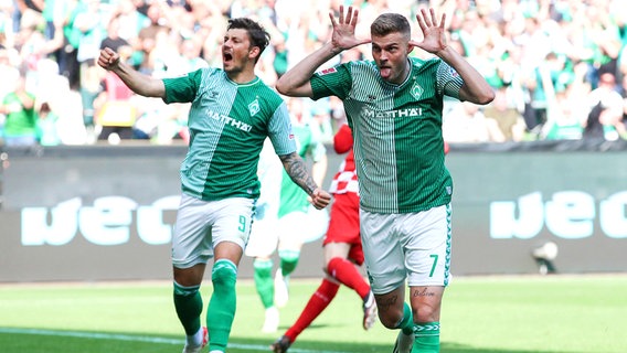 Werders Marvin Ducksch (r.) bejubelt einen Treffer gegen Mainz. © IMAGO/Jan Huebner 