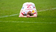 Kiels Mikkel Kirkeskov ist nach einem Gegentreffer enttäuscht. © IMAGO / foto2press 
