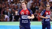 Lukas Jörgensen von der SG Flensburg-Handewitt jubelt. © IMAGO / Lobeca 