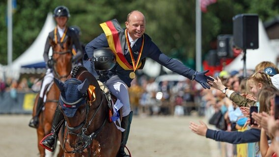 Michael Jung mit Chipmunk © picture alliance/dpa | Friso Gentsch 