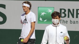 Tennisprofi Alexander Zverev (l.) mit Trainer David Ferrer.