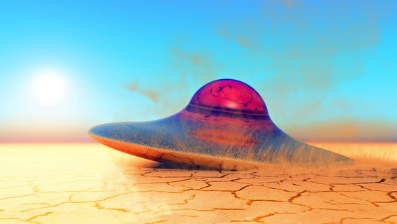 Darstellung eines Ufos, das auf einem Planeten landet. © colourbox Foto: daniel guffanti