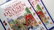 Das Bild zeigt das Buch-Cover von "Min iarst düüsen wurden". © NDR Foto: Karin Haug