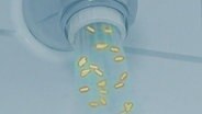 Ein animiertes Bild von Keimen im Wasser.  