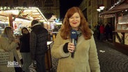 Reporterin Sophie Mühlmann berichtet vom Weihnachtsmarkt in Hildesheim. © Screenshot 