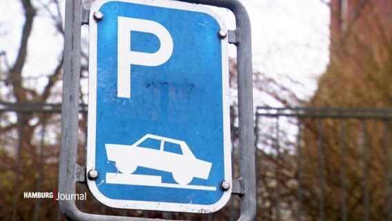 Auf einem Verkehrsschild ist abgebildet, dass Autos nur mit dem Vorderreifen auf dem Bürgersteig geparkt werden dürfen. © Screenshot 