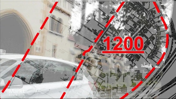 Ein Bild einer blassen Karte vor ein Auto und roter Zahl im rechten Teil des Bildes © Screenshot 