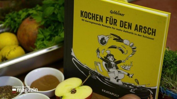 Kieler bringen Kochbuch „Kochen für den Arsch“ heraus. © Screenshot 