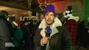 Reporter Tino Nowitzki berichtet live vom Adventsmarkt in Bad Harzburg. © Screenshot 