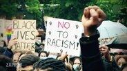 Szene einer Anti-Rassismus Demonstration  