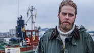 Dokumentarfilmer Henrik Evertsson vor Schiff  
