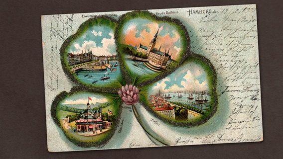 Auf einer historischen Postkarte ist ein Kleeblatt abgebildet.  