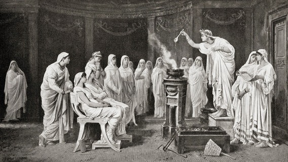 Darstellung von Vestallinnen, die das heilige Feuer in Rom kultivieren, das nicht erlöschen darf. © picture alliance / Design Pics | Ken Welsh 