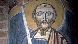 Der Apostel Paulus mit dem Schwert. Wandmalerei an einem Pfeiler. © picture-alliance / akg-images Foto: Tristan Lafranchis