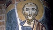 Der Apostel Paulus mit dem Schwert. Wandmalerei an einem Pfeiler. © picture-alliance / akg-images Foto: Tristan Lafranchis