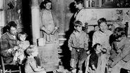 Eine kinderreiche Familie aus den USA in ihrer Unterkunft um 1930 © picture-alliance / akg-images Foto: Lewis W. Hine