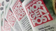 Blick auf mehrere Ausgaben der "Hamburger Morgenpost". © picture alliance/dpa Foto: Christiane Bosch