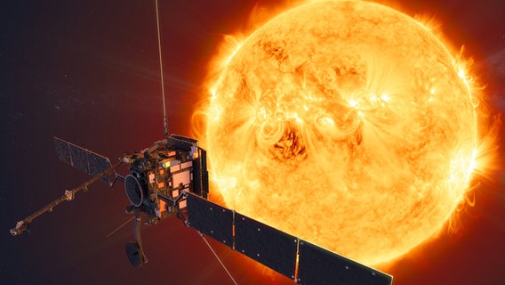 Eine Grafik der Sonde Solar Orbiter vor der Sonne. © ATG medialab/ESA/dpa 