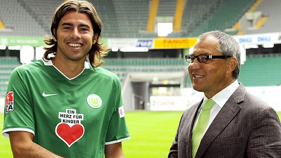 Andrea Barzagli und Wolfsburgs Trainer Felix Magath © dpa 